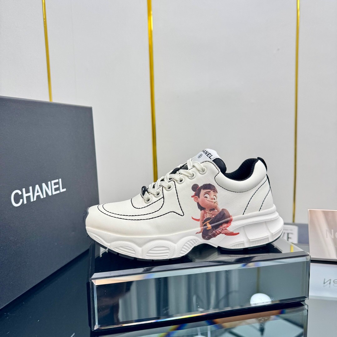 2025 Women Chanel White Leather Sneakers Cartoon Graphic